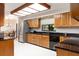 Well-lit kitchen featuring stainless steel appliances and granite countertops at 429 Kimberly Ct, Sanford, FL 32771