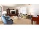 Comfortable living room with plush seating, built-in shelving, and neutral carpet at 429 Kimberly Ct, Sanford, FL 32771