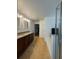 Primary bathroom features a dual vanity with granite counters and a separate shower and tub at 4920 E Lake Cove Blvd, St Cloud, FL 34771