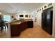 Kitchen with granite counters, stainless steel appliances, and open layout at 4920 E Lake Cove Blvd, St Cloud, FL 34771