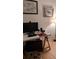 Home office with a computer setup, artwork, and ample lighting at 4920 E Lake Cove Blvd, St Cloud, FL 34771