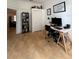 Office space adjacent to living room and featuring book case and closet at 4920 E Lake Cove Blvd, St Cloud, FL 34771