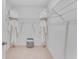 Walk-in closet with shelving providing ample storage space at 5063 Tana Ter, St Cloud, FL 34772