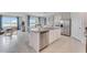 Modern kitchen with a granite island, stainless steel appliances, and an open layout for seamless entertaining at 5063 Tana Ter, St Cloud, FL 34772