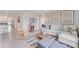 Bright living room features neutral colors, modern furniture, and lots of natural light at 5063 Tana Ter, St Cloud, FL 34772