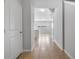 Spacious hallway features tile flooring and neutral paint, leading to the living areas at 5118 Adelaide Dr, Kissimmee, FL 34746