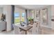 Dining area features a table with seating and sliding glass doors at 5133 Masser Rd, St Cloud, FL 34772