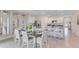 Dining room adjacent to the kitchen and features coastal decor, table, and seating at 5133 Masser Rd, St Cloud, FL 34772
