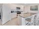 Kitchen island with granite countertops and stainless appliances at 5133 Masser Rd, St Cloud, FL 34772