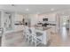 Island kitchen features granite countertops, stainless appliances and seating at 5133 Masser Rd, St Cloud, FL 34772