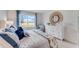 Comfortable main bedroom filled with natural light with a view of lush landscape at 5133 Masser Rd, St Cloud, FL 34772
