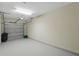 Spacious two-car garage with a new garage door and ample space for parking and storage at 7021 Della Dr # 51, Orlando, FL 32819