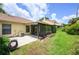 Spacious backyard with a covered patio offering great outdoor living at 711 Swan Ln, Altamonte Springs, FL 32701