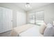 Bright bedroom with closet, natural light, and neutral color scheme for a tranquil feel at 711 Swan Ln, Altamonte Springs, FL 32701