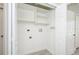 The utility room has hookups for a washer and dryer, as well as built in shelves for storage at 711 Swan Ln, Altamonte Springs, FL 32701
