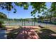 Fenced tennis courts in a community setting, offering recreational opportunities for residents at 711 Swan Ln, Altamonte Springs, FL 32701