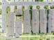 Overhead view displays this townhome with a well-maintained roof and surrounding community amenities at 744 Yukon Ln, Debary, FL 32713