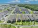 Aerial view reveals the home's setting amidst a community with well-kept lawns and nearby amenities at 744 Yukon Ln, Debary, FL 32713