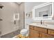 Modern bathroom featuring an LED mirror, a walk-in shower with gray chevron tile, and stylish fixtures at 744 Yukon Ln, Debary, FL 32713