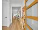Bright foyer with wood floors and modern decor, offering a glimpse into the open-concept living space at 744 Yukon Ln, Debary, FL 32713