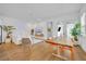 Bright living room with modern decor, a stylish dining area, and plenty of natural light, perfect for entertaining at 744 Yukon Ln, Debary, FL 32713