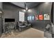 Cozy media room featuring tiered seating, a movie poster gallery, and a high-end entertainment system at 744 Yukon Ln, Debary, FL 32713