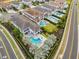 Bird's eye view featuring backyard pools and meticulously landscaped yards in a suburban neighborhood at 7905 Jacks Club Dr, Kissimmee, FL 34747