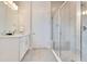 Elegant bathroom with a spacious shower, marble countertops, and contemporary design, offering a luxurious retreat at 7905 Jacks Club Dr, Kissimmee, FL 34747