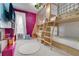 Fun ' bedroom with built-in bunk beds, a climbing wall, and themed decor and furnishings at 7905 Jacks Club Dr, Kissimmee, FL 34747