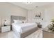 Comfortable bedroom with a luxurious bed, soft lighting, and elegant decorations for a relaxing ambiance at 7905 Jacks Club Dr, Kissimmee, FL 34747