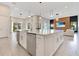 Bright kitchen with a marble island and stainless steel appliances, perfect for modern living at 7905 Jacks Club Dr, Kissimmee, FL 34747