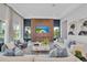 Bright living room with a modern fireplace and sleek furniture at 7905 Jacks Club Dr, Kissimmee, FL 34747