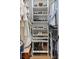 This closet features a variety of clothing and shoes all neatly organized on shelves and racks at 8717 Se 156Th St, Summerfield, FL 34491