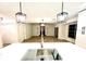 View from kitchen island into the living room with fireplace feature at 8825 Larwin Ln, Orlando, FL 32817