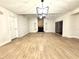 Bright living room with high ceilings, fireplace, and sliding glass doors to the back at 8825 Larwin Ln, Orlando, FL 32817