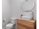 Modern powder room with unique wall texture, floating vanity, vessel sink, and contemporary fixtures at 8848 Bismarck Palm Dr, Winter Garden, FL 34787