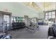 Bright, modern gym featuring free weights, machines, and mirrored walls at 8848 Bismarck Palm Dr, Winter Garden, FL 34787