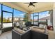 Enclosed patio with comfortable outdoor seating at 889 Boxelder Ave, Minneola, FL 34715