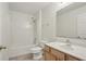 Full bathroom featuring a shower-tub and wood vanity at 905 Cascade Falls Ln, Deland, FL 32720