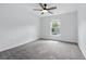 Bedroom with carpet, ceiling fan, and natural light at 905 Cascade Falls Ln, Deland, FL 32720