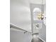 Bright entryway features beautiful chandelier, high ceiling, and large window at 905 Cascade Falls Ln, Deland, FL 32720