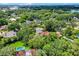 Aerial view of the neighborhood highlighting the large lot, mature trees, and pristine setting at 906 Alhambra Ct, Orlando, FL 32804