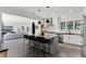 Spacious open concept kitchen with large center island and stainless steel appliances at 906 Alhambra Ct, Orlando, FL 32804