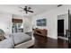 Main bedroom featuring a modern platform bed, hardwood floors and lots of light at 906 Alhambra Ct, Orlando, FL 32804