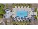 Aerial view of community pool, landscaping, and adjacent recreational area at 907 Celadon St, Winter Garden, FL 34787