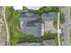 Aerial view of the property showcasing the home's layout, landscaping, and surrounding area at 907 Celadon St, Winter Garden, FL 34787