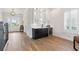 Stylish bar area featuring custom cabinets, white countertops, wine fridge, and modern fixtures at 907 Celadon St, Winter Garden, FL 34787