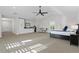 Expansive suite featuring high ceilings, bar area, neutral color palette, and a comfortable, welcoming atmosphere at 907 Celadon St, Winter Garden, FL 34787