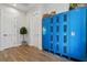 Organized mudroom with lockers, and pantry and laundry room access at 907 Celadon St, Winter Garden, FL 34787