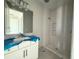 New bathroom featuring walk-in shower and modern white vanity at 960 Hawksnest Pt, Oviedo, FL 32765
